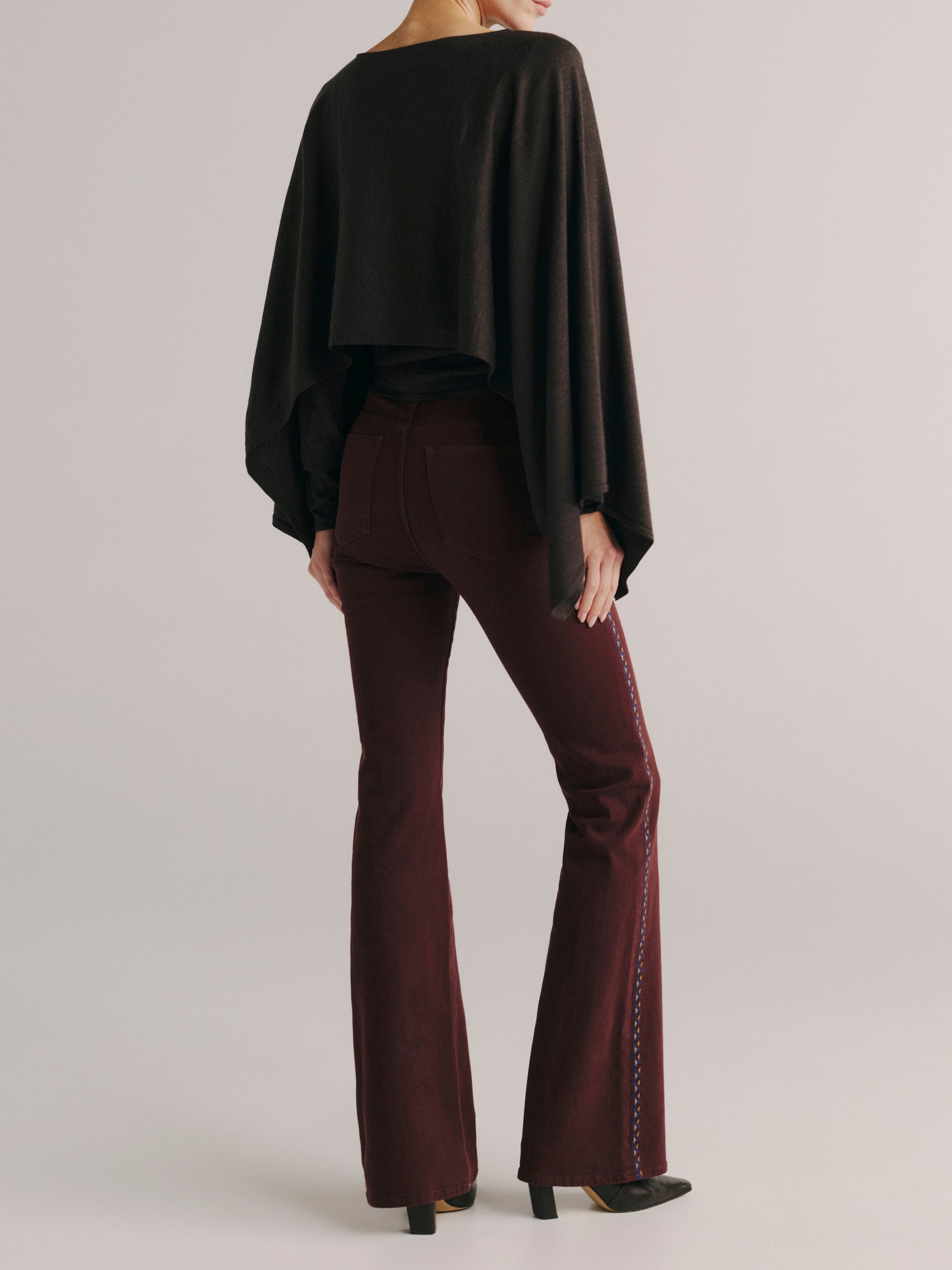 DL1961 women's Bridget Bootcut High Rise Instasculpt jeans in 'Burgundy Embroidery', back view showing the rear pockets.