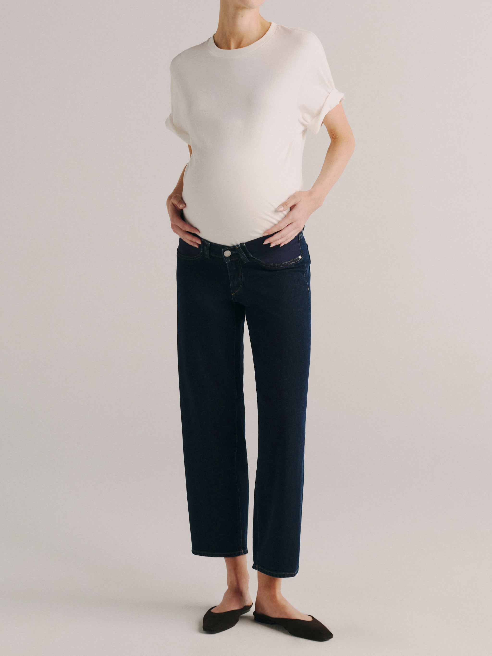 DL1961 women's Thea Boyfriend maternity jeans in dark indigo 'Night Out', front view with an over-bump panel and white tee.