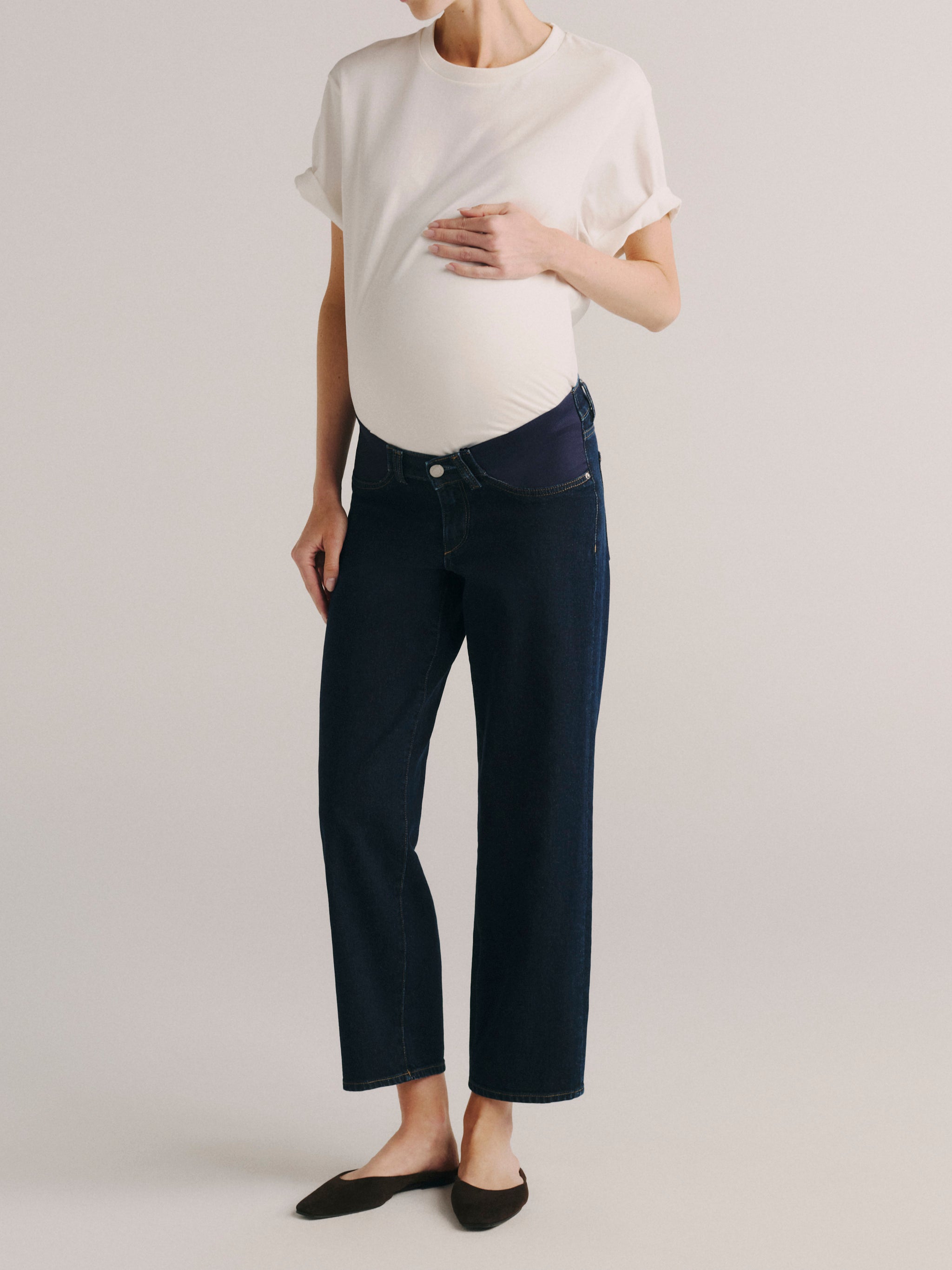 DL1961 women's Thea Boyfriend maternity jeans in dark indigo 'Night Out', angled front view showing the relaxed leg.