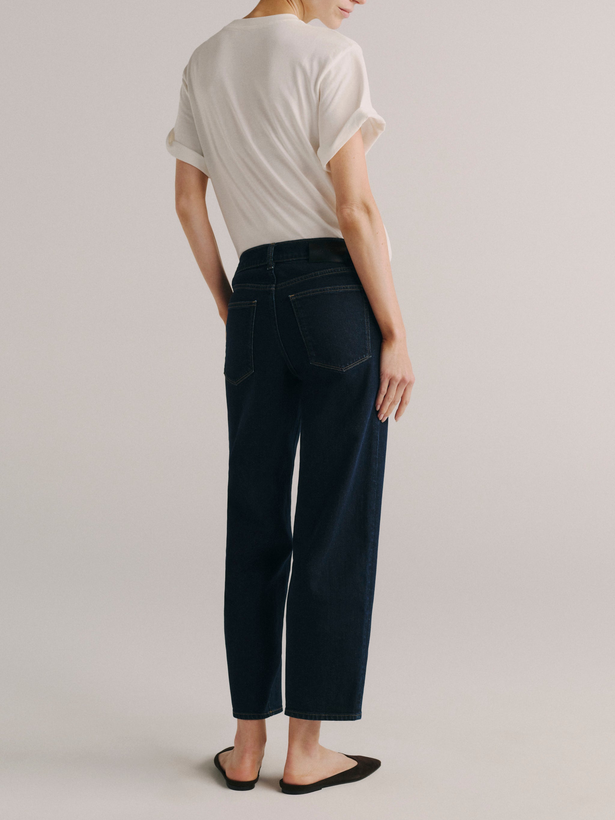 DL1961 women's Thea Boyfriend maternity jeans in dark indigo 'Night Out', back view showing the rear pockets and cropped hem.