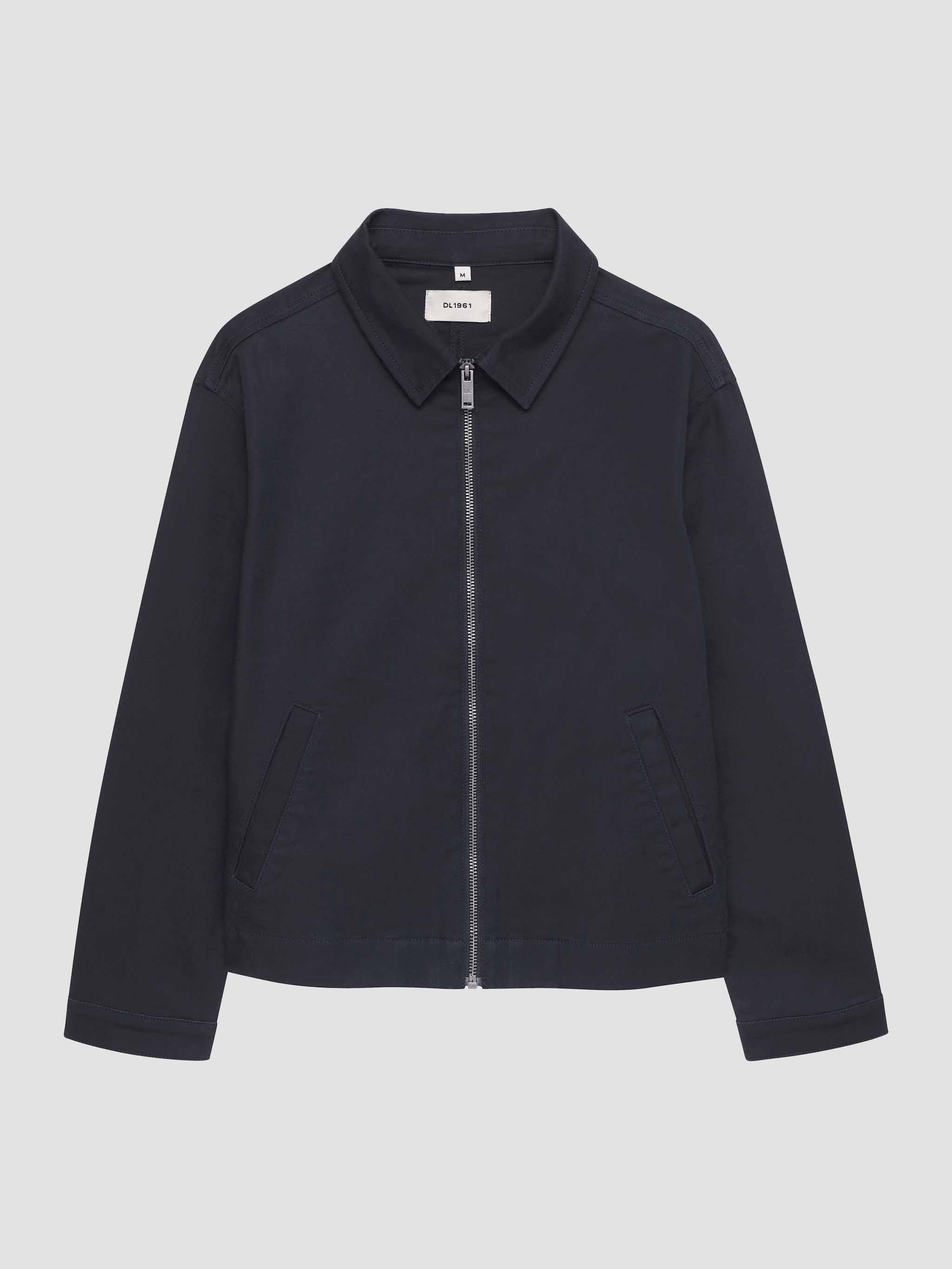 Navy blue jacket on a light gray background
