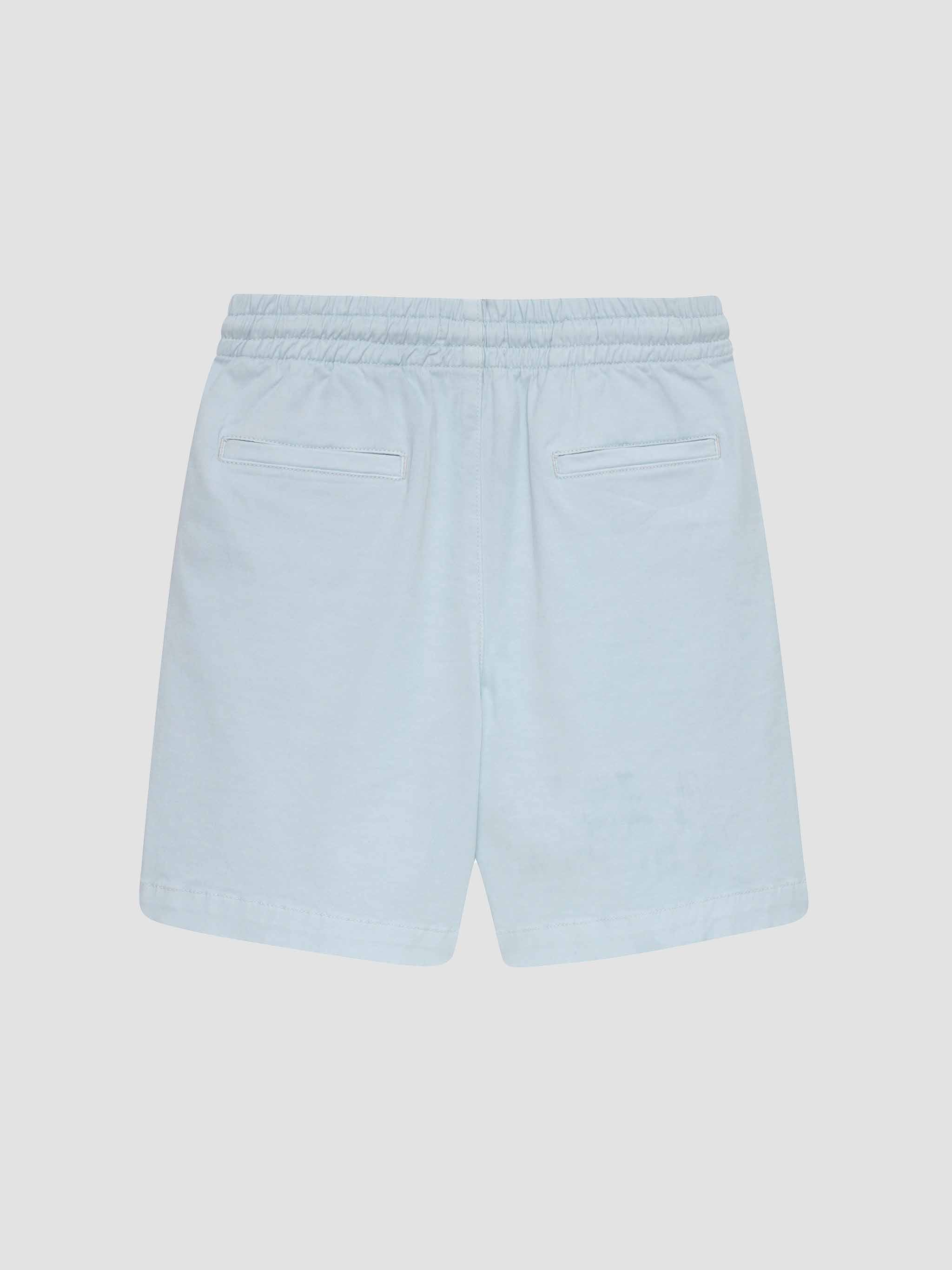 Light blue shorts on a light gray background