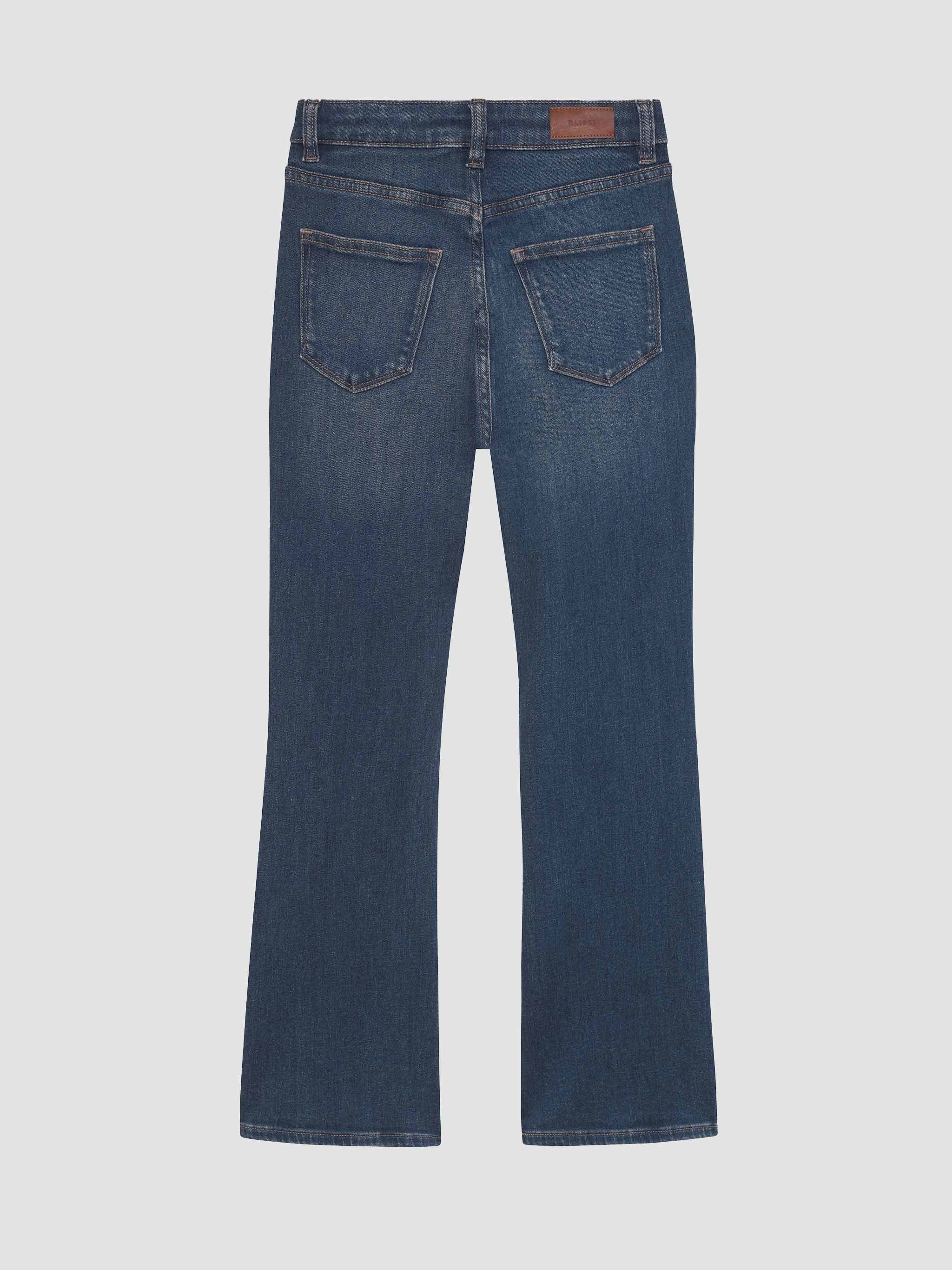 Blue jeans on a light gray background