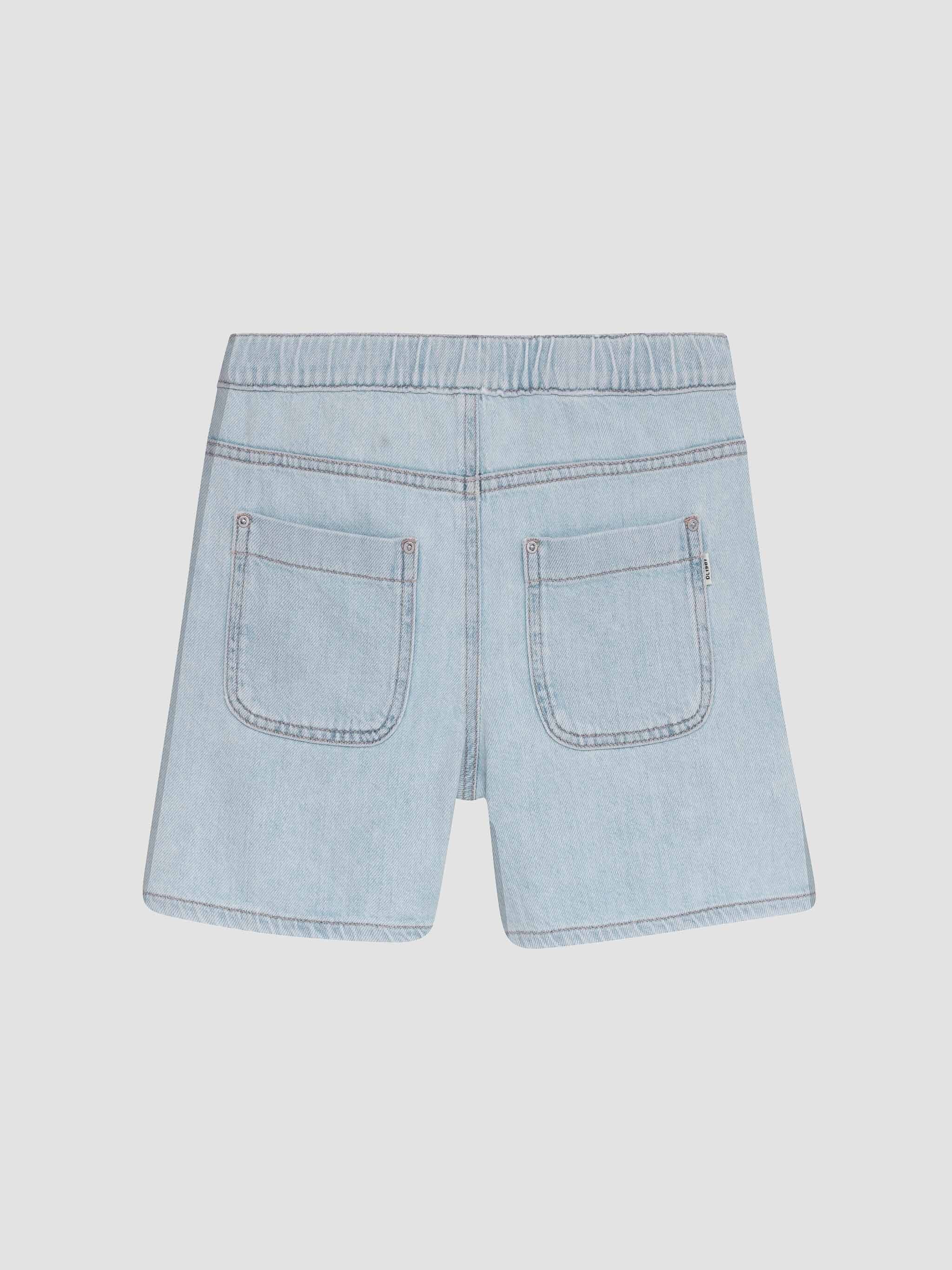 Light blue denim shorts on a light gray background