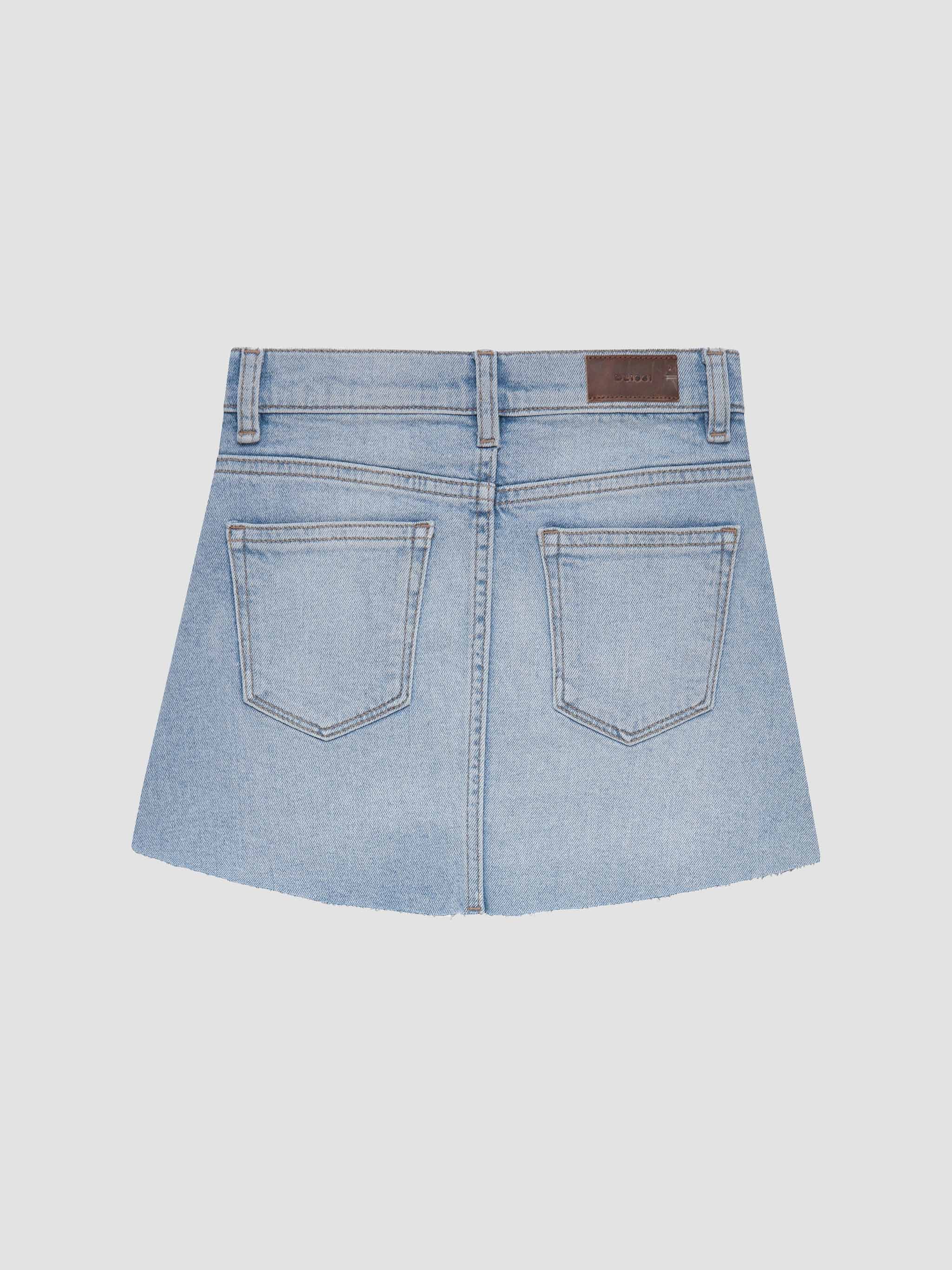 Light blue denim skirt on a white background