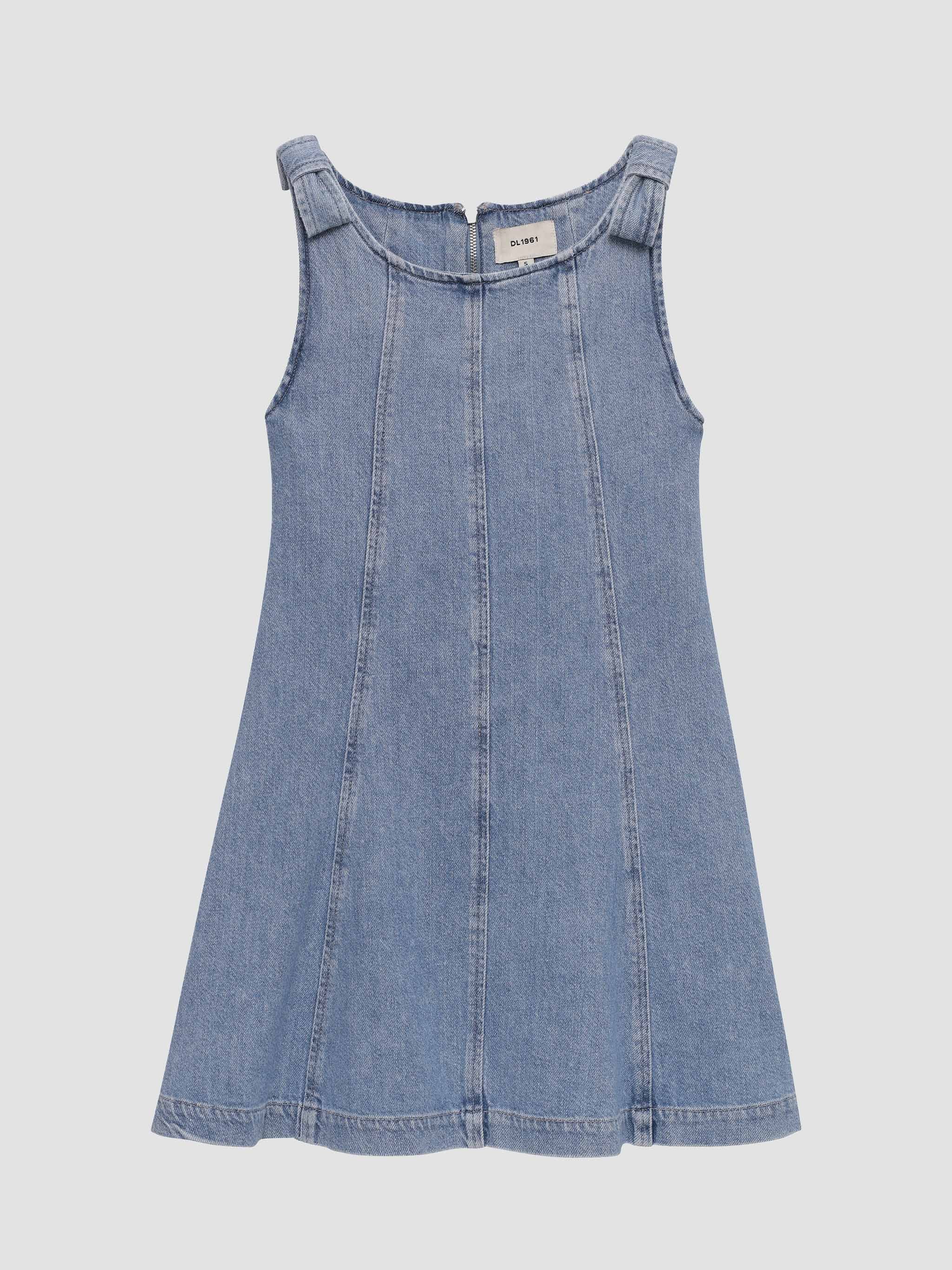 Blue denim dress on a light gray background