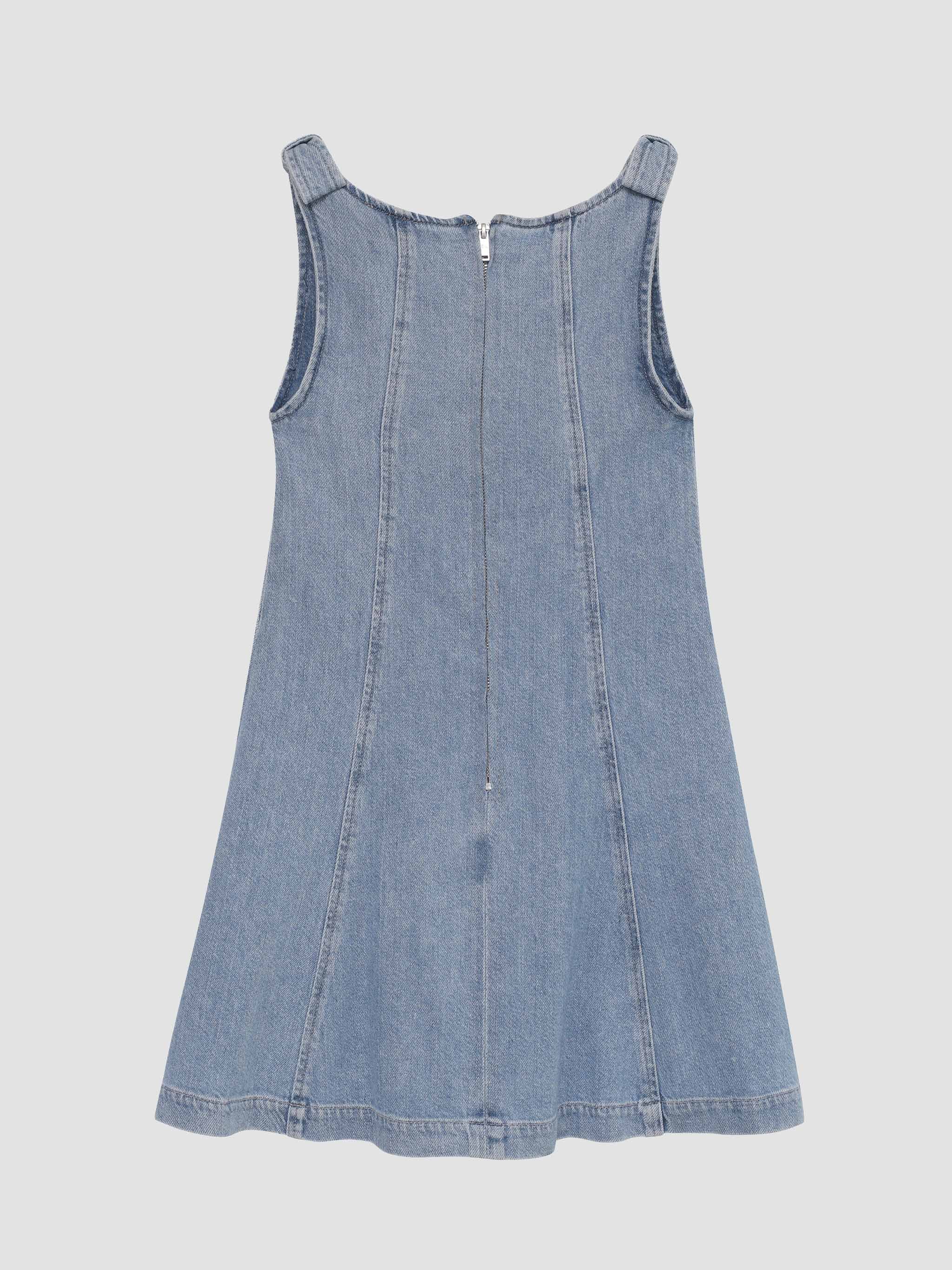 Blue denim dress on a light gray background