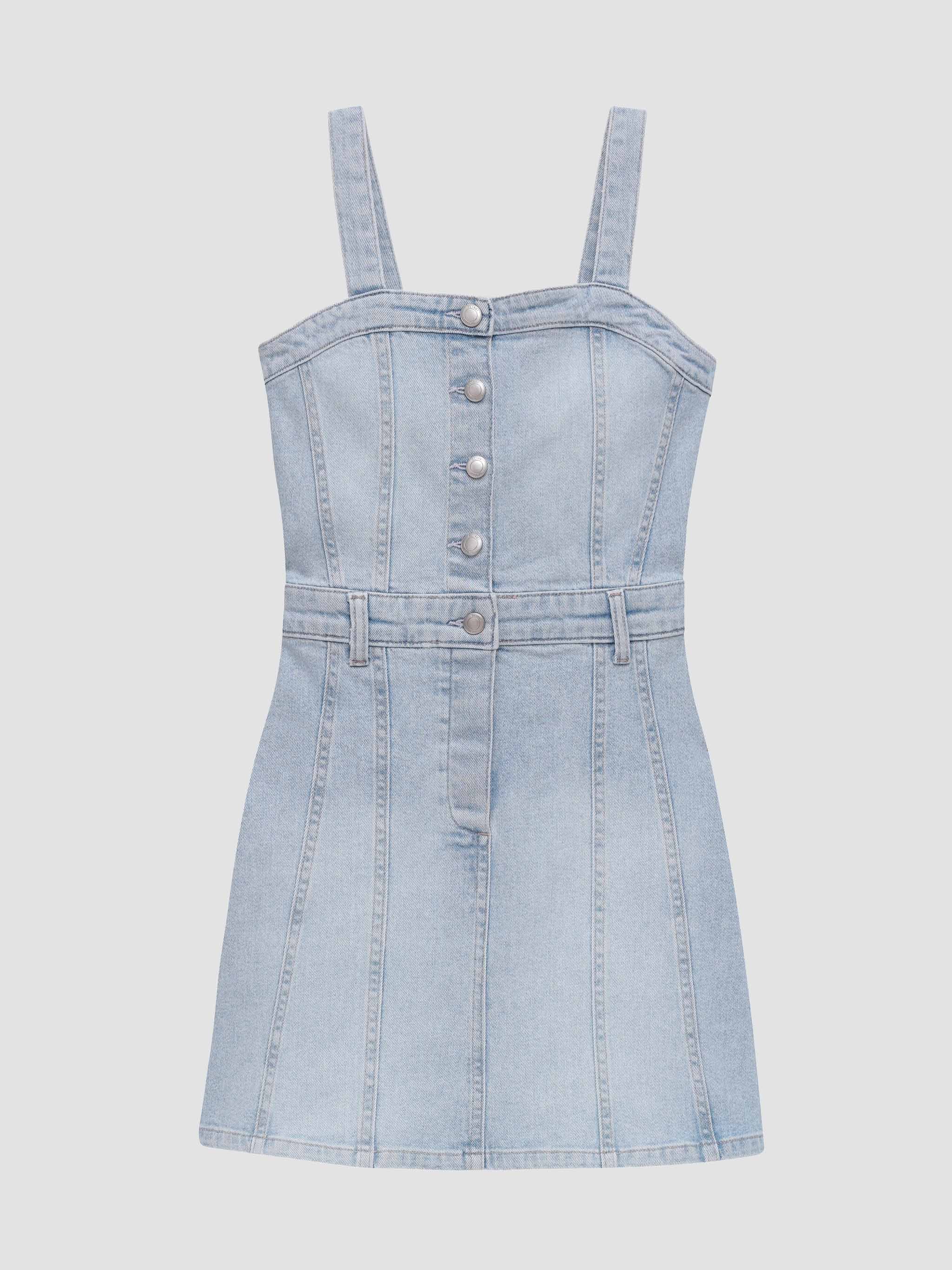 Light blue denim pinafore dress on a white background