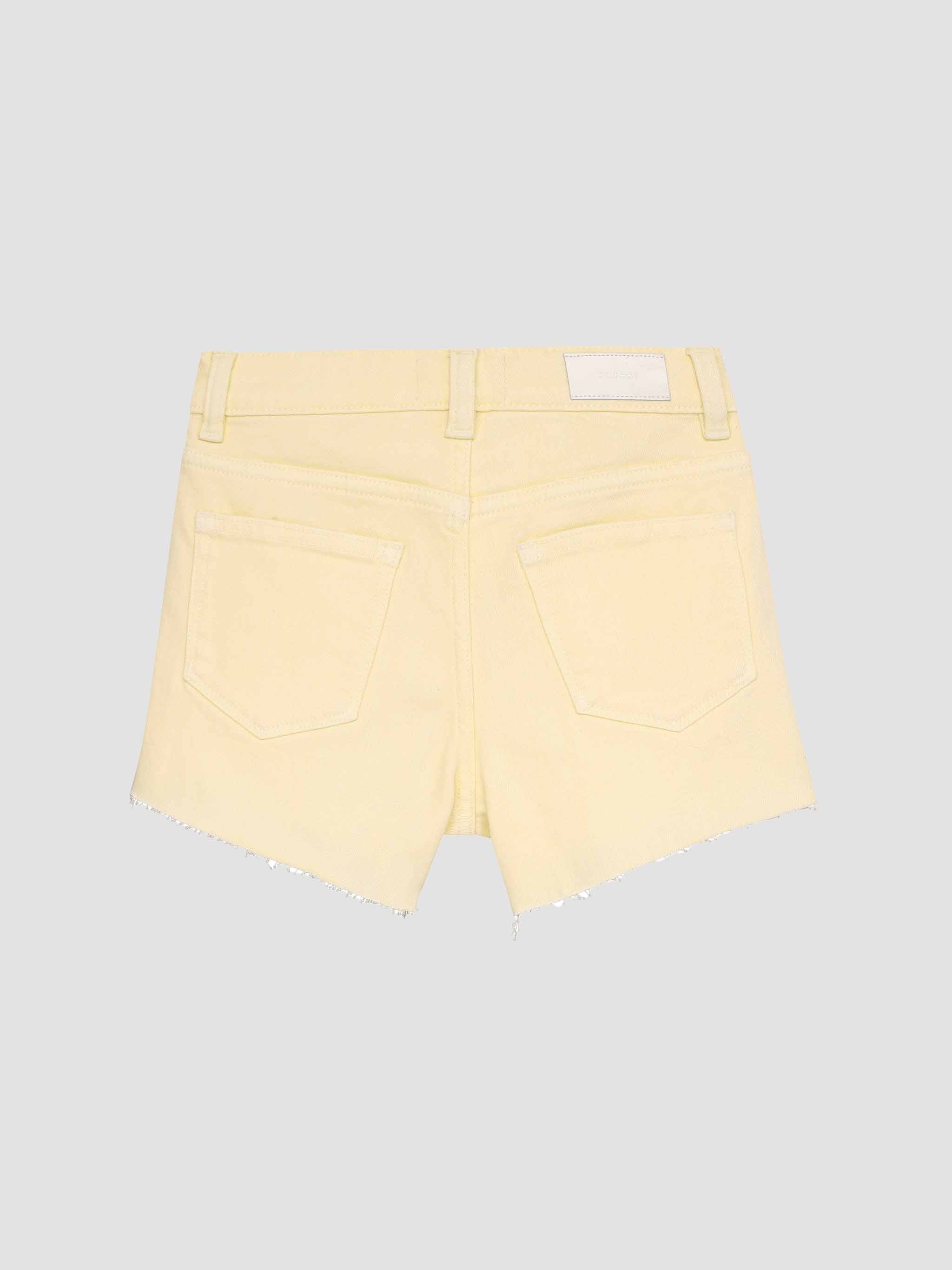 Yellow shorts on a light gray background