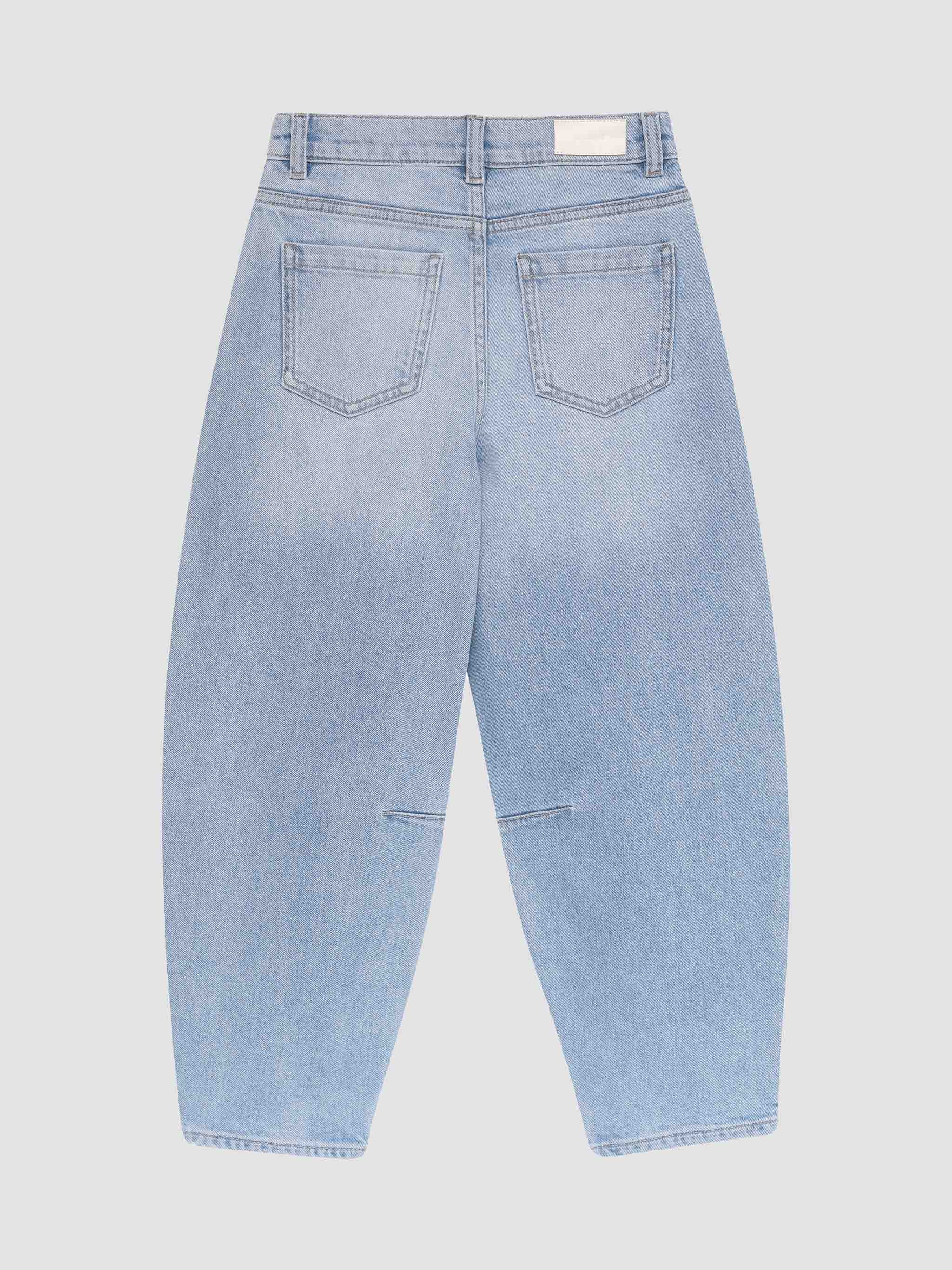 Light blue jeans on a light gray background