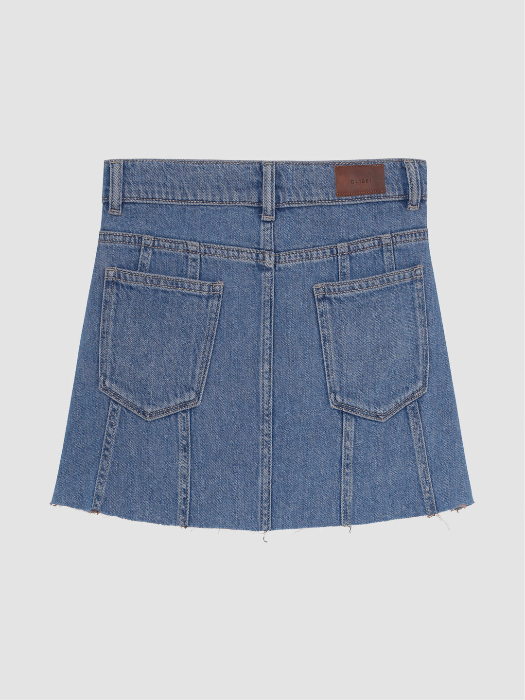 DL1961 girls' Jenny mini skirt in medium blue 'Indigo Rose', flat back view with patch pockets and frayed hem.