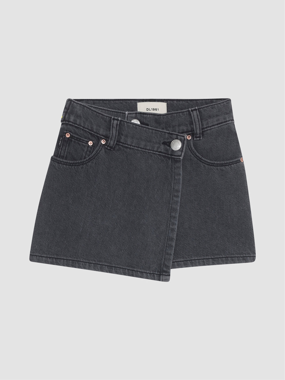 DL1961 girls' Lola skort in washed charcoal 'Nightspell', flat front view with asymmetric wrap panel.