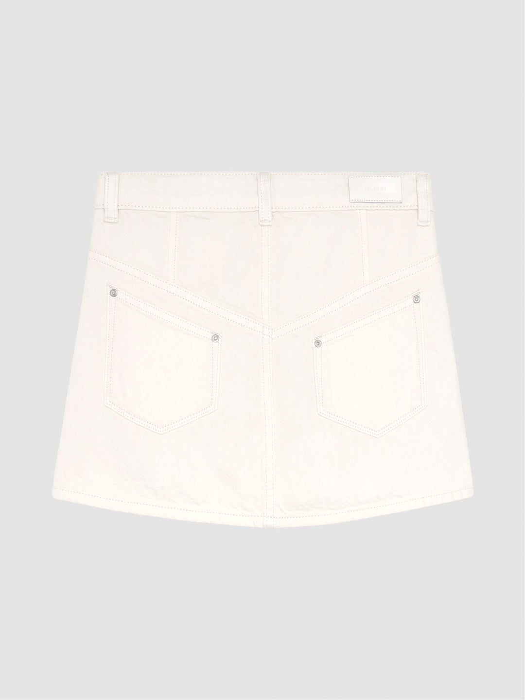 DL1961 girls' Jenny mini skirt in cream denim 'Sugar Cookie', flat back view.