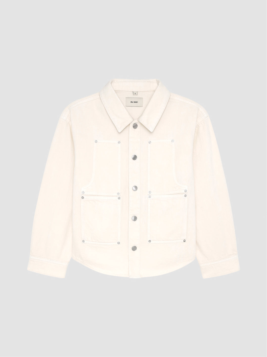 DL1961 girls' Olivia shirt in cream 'Sugar Cookie' with patch pockets, flat front view.