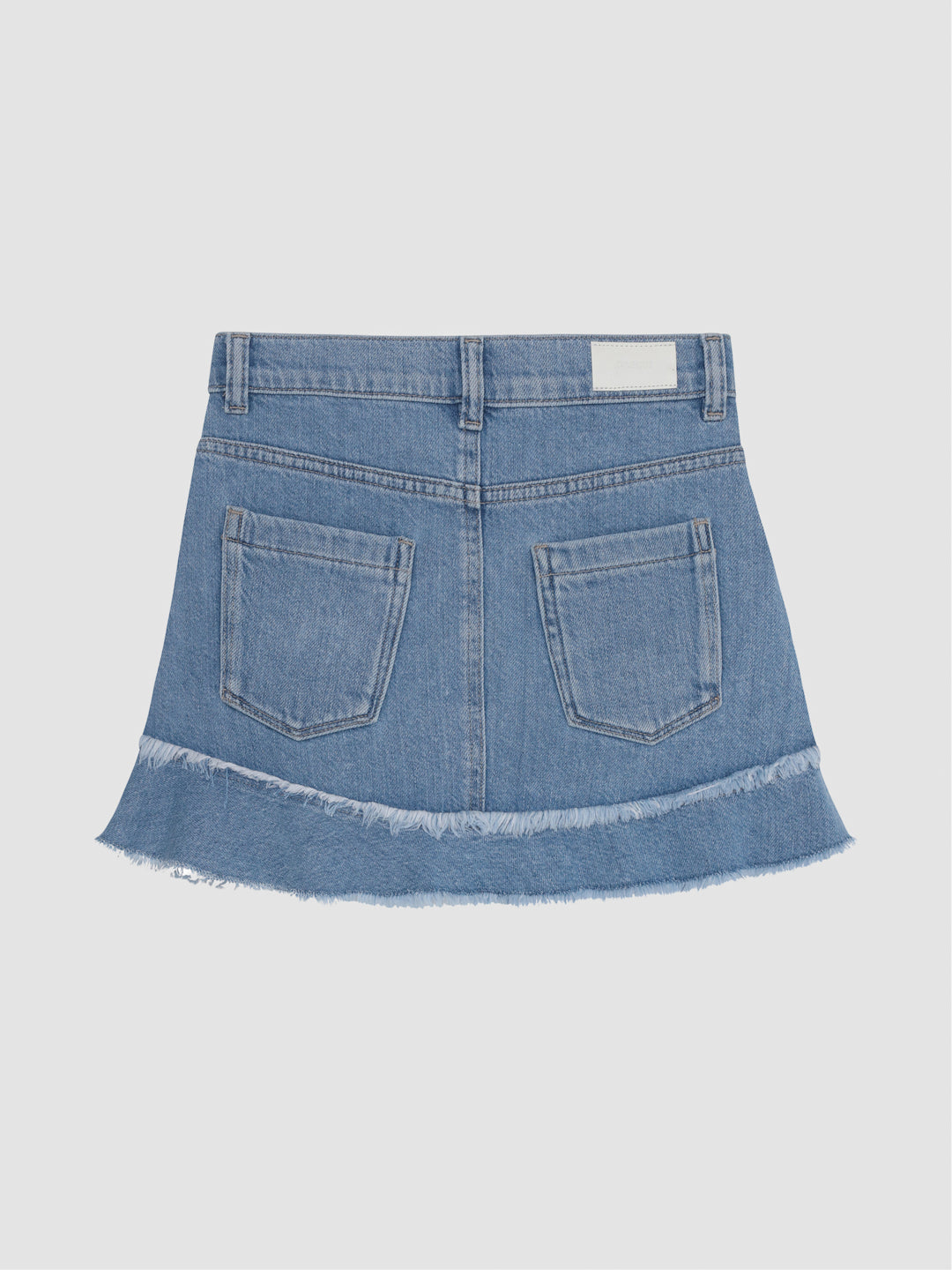 DL1961 girls' Jenny ruffle-hem mini skirt in light blue 'Unraveled' with frayed hem, flat back view.