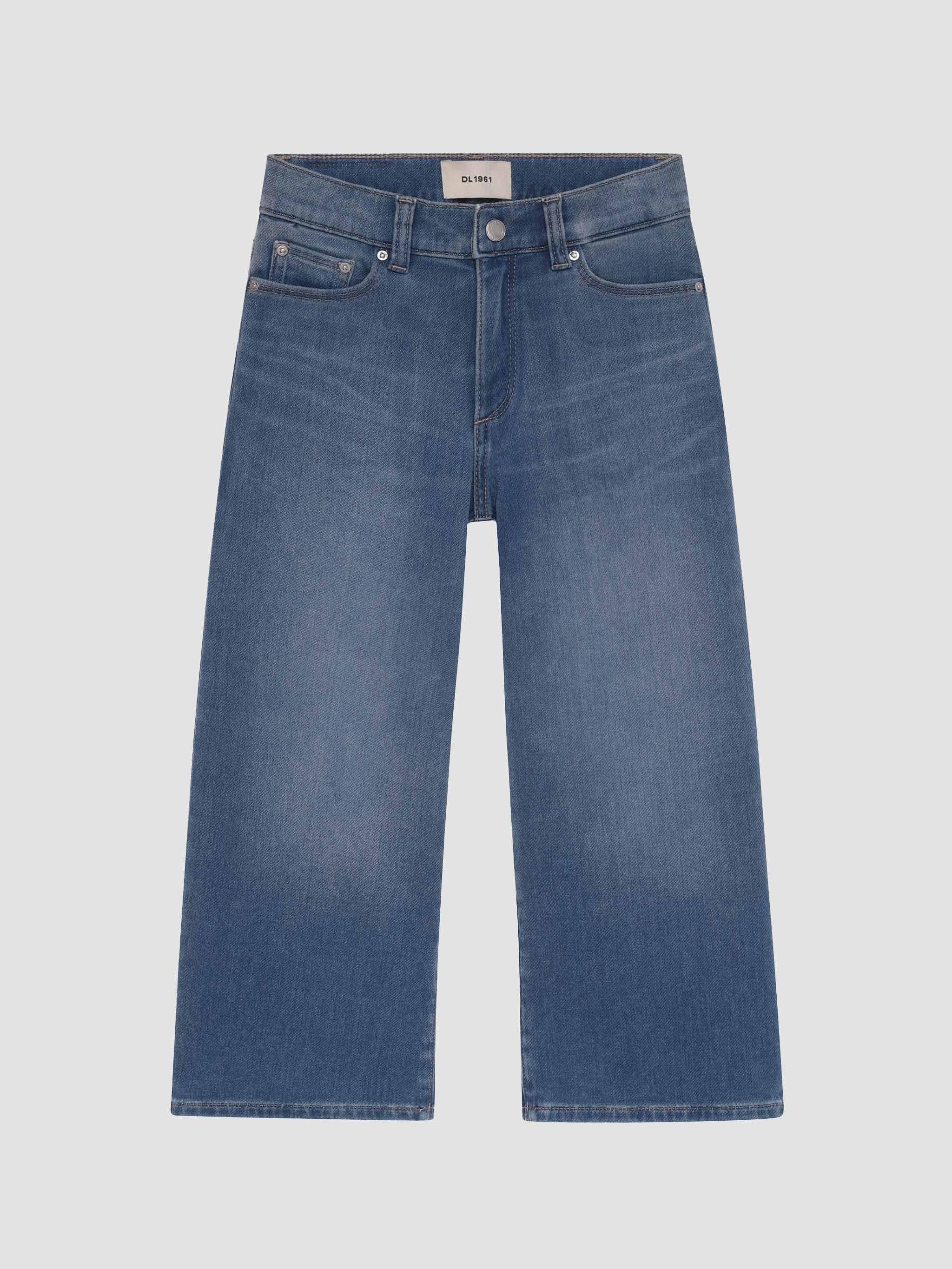 Blue jeans on a light gray background