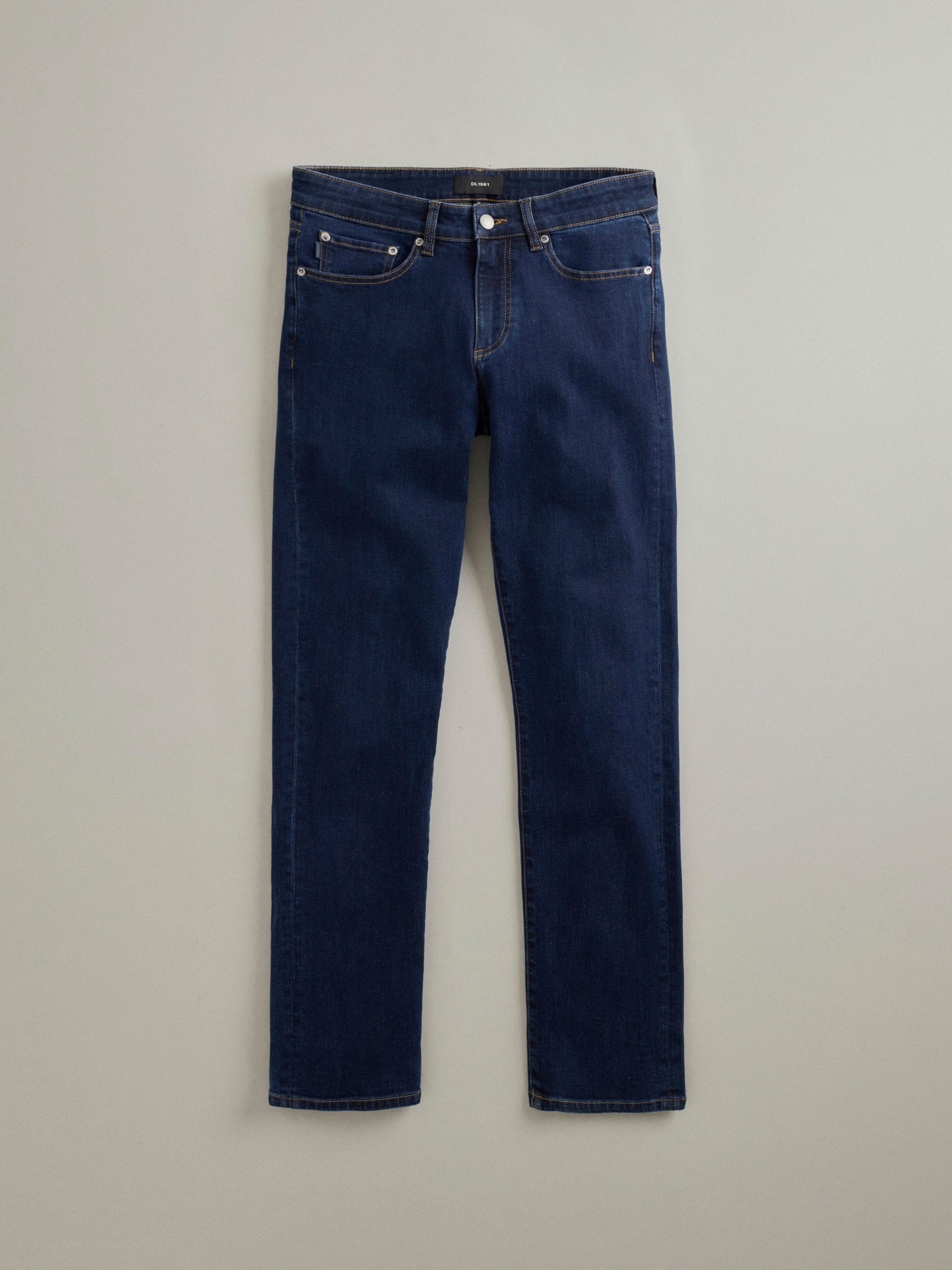 DL1961 men's jeans in dark indigo 'After Hours', flat lay front view.