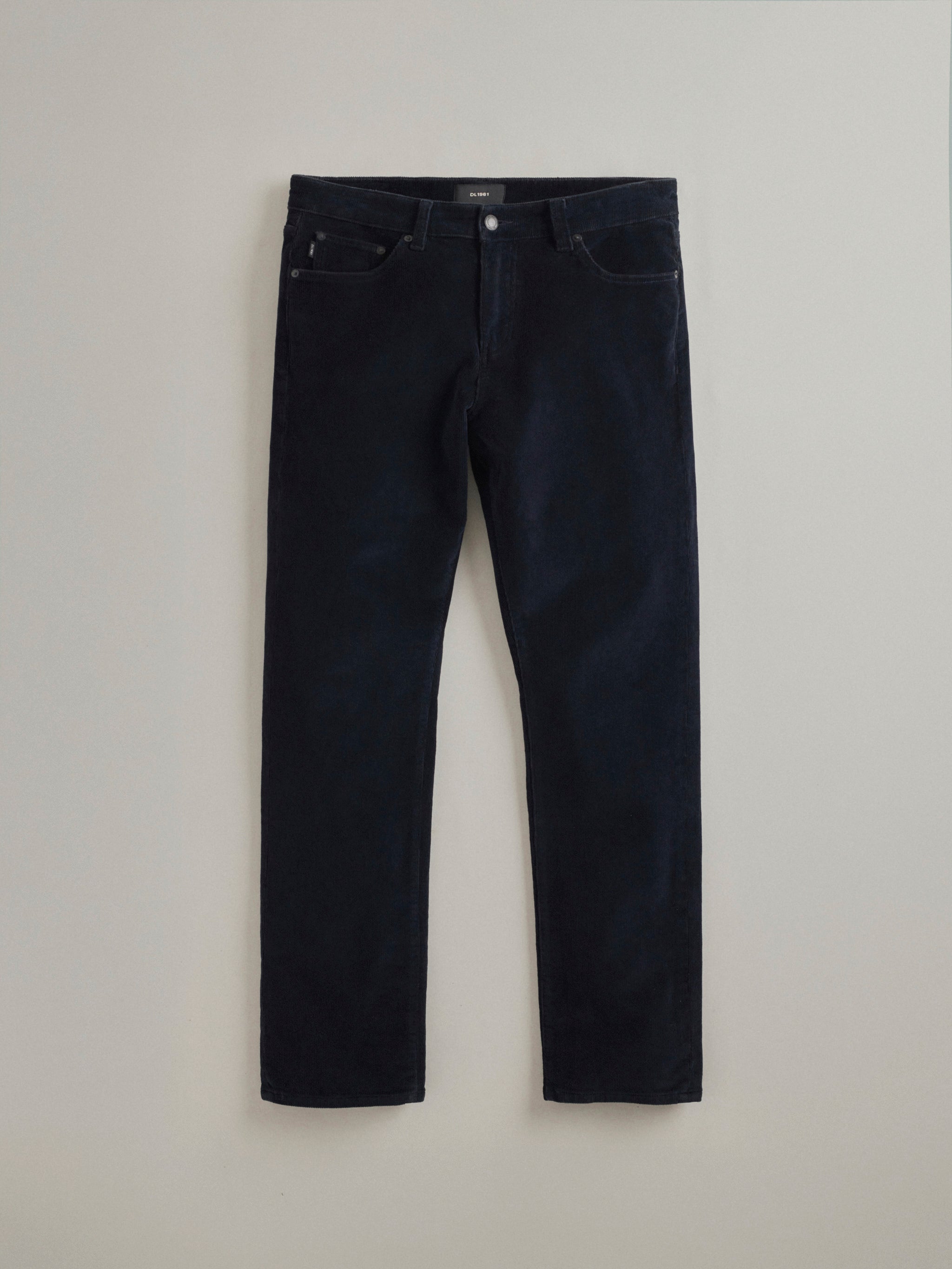 DL1961 men's corduroy pants in dark navy 'Skyline', flat lay front view.