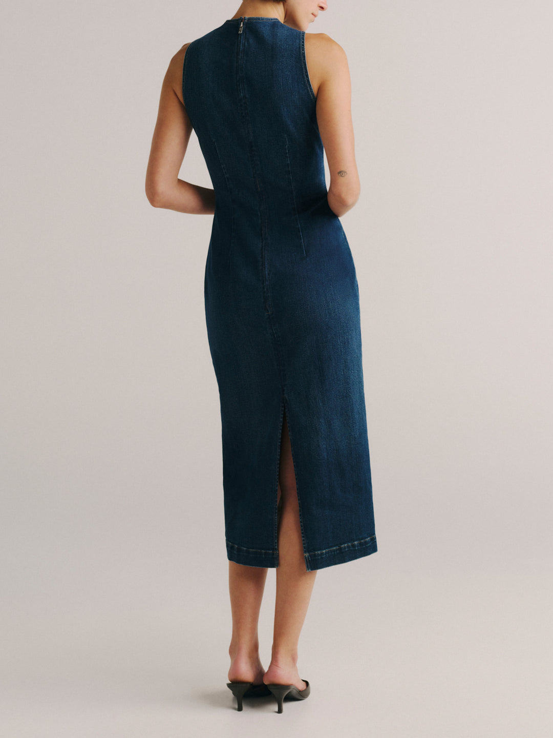 DL1961 Esme sleeveless denim midi dress in dark-indigo 'Sea Front' wash, back view with zip and back slit.