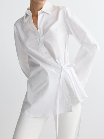 White shirt on a person against a white background