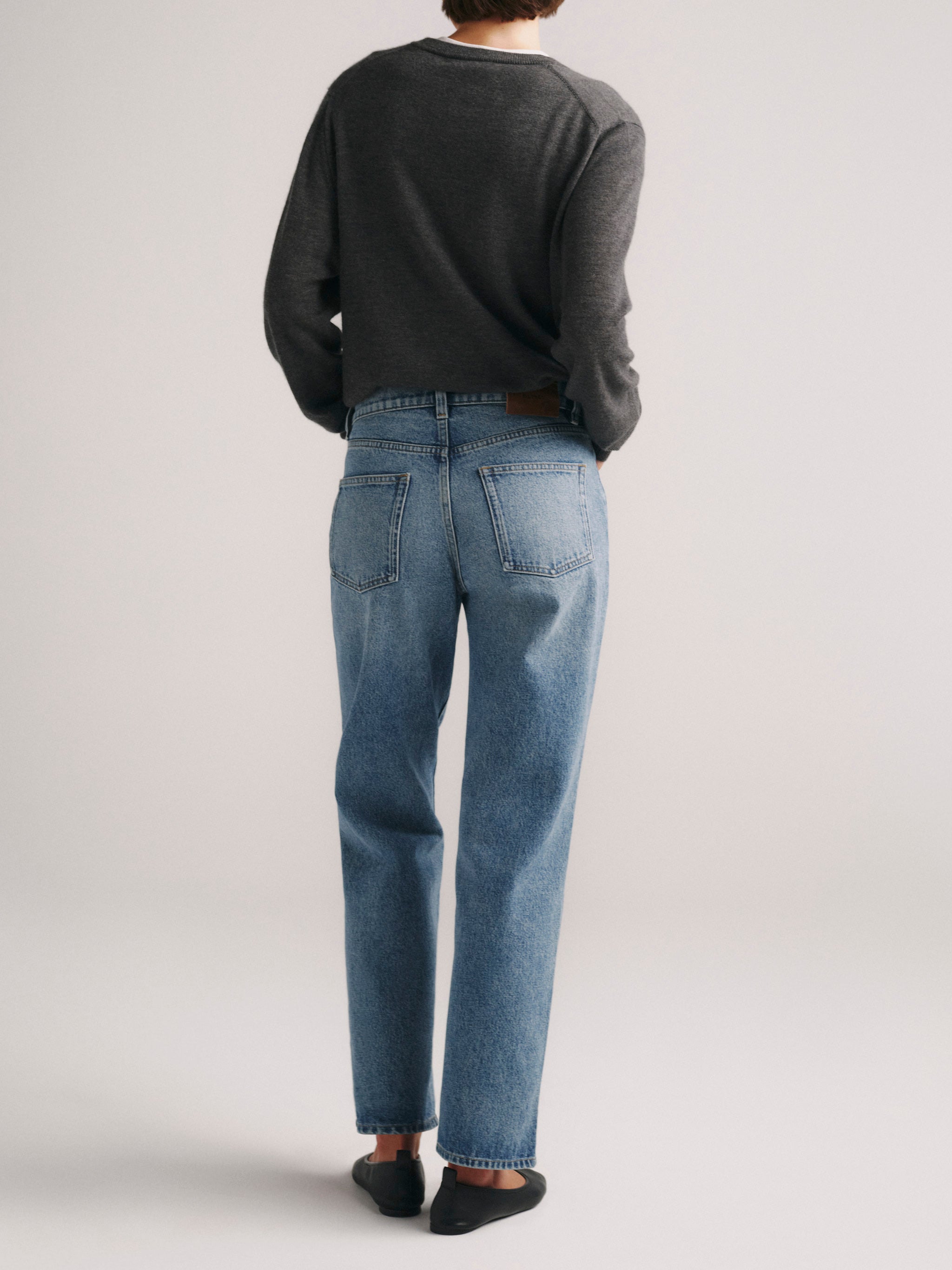 DL1961 x Olympia V-Neck Cashmere Sweater in Dark Grey — back view