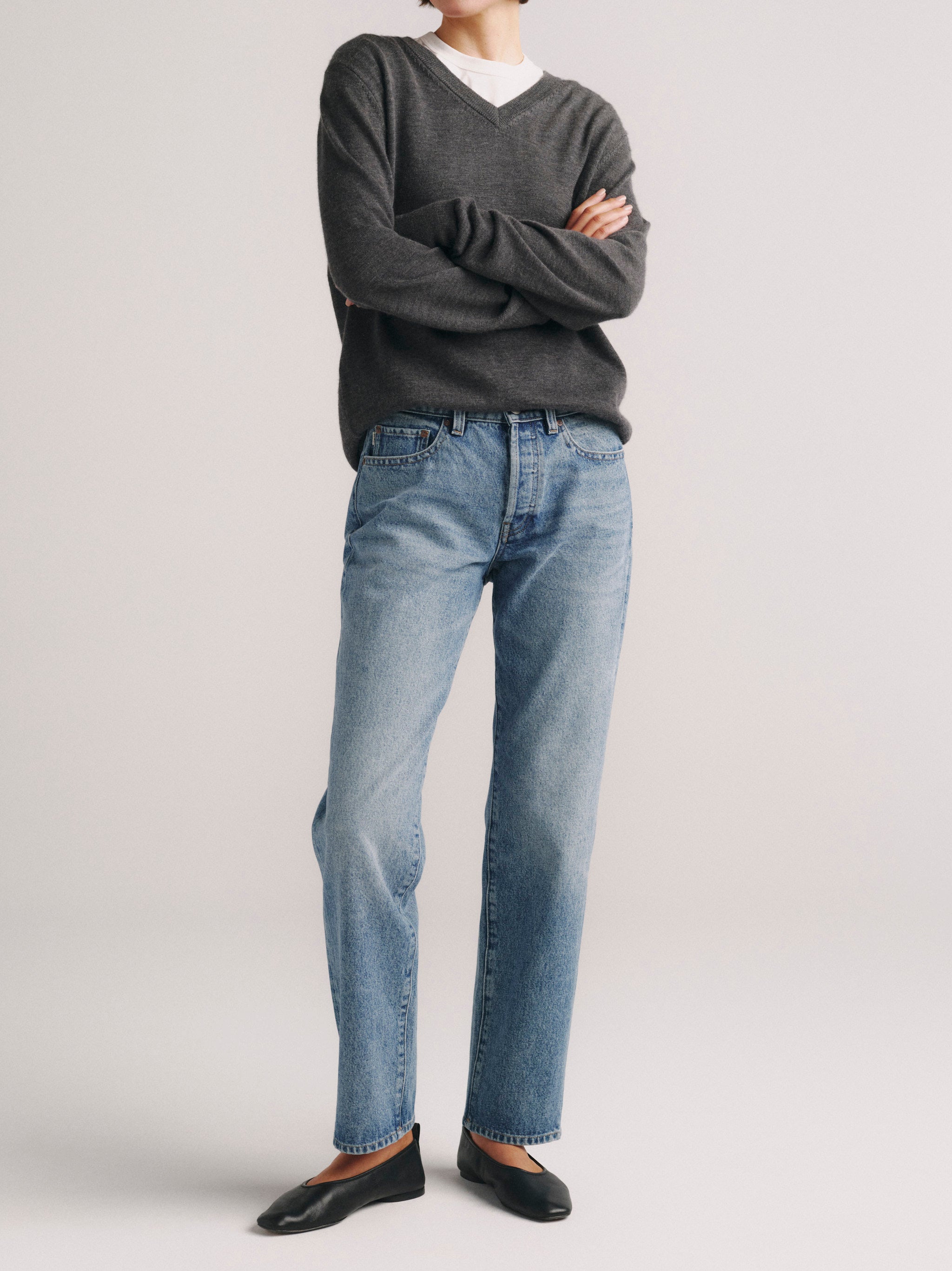 DL1961 x Olympia V-Neck Cashmere Sweater in Dark Grey — three-quarter view