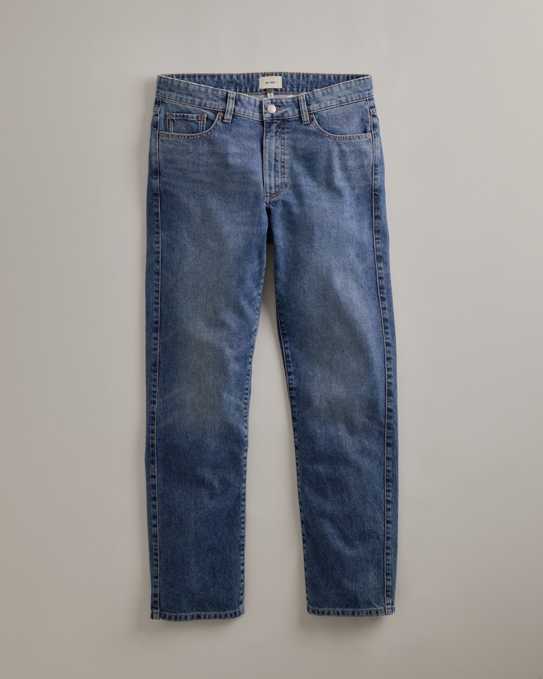 DL1961 men's Noah Straight Jeans in 'Ironblue' — studio flat lay packshot on a plain background, no model.