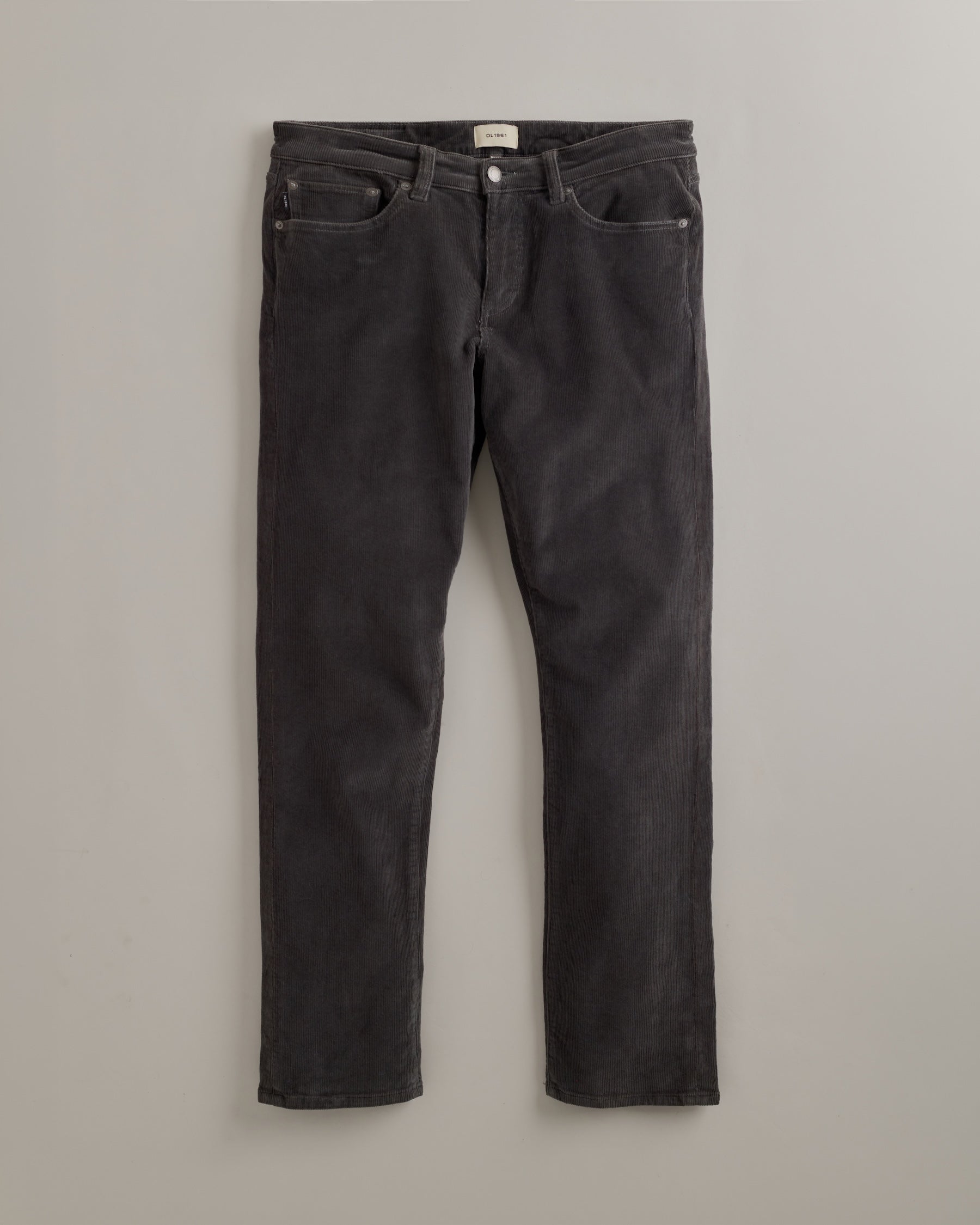 DL1961 men's Nick Slim Corduroy Pants in 'Graphite' — studio flat lay packshot on a plain background, no model.