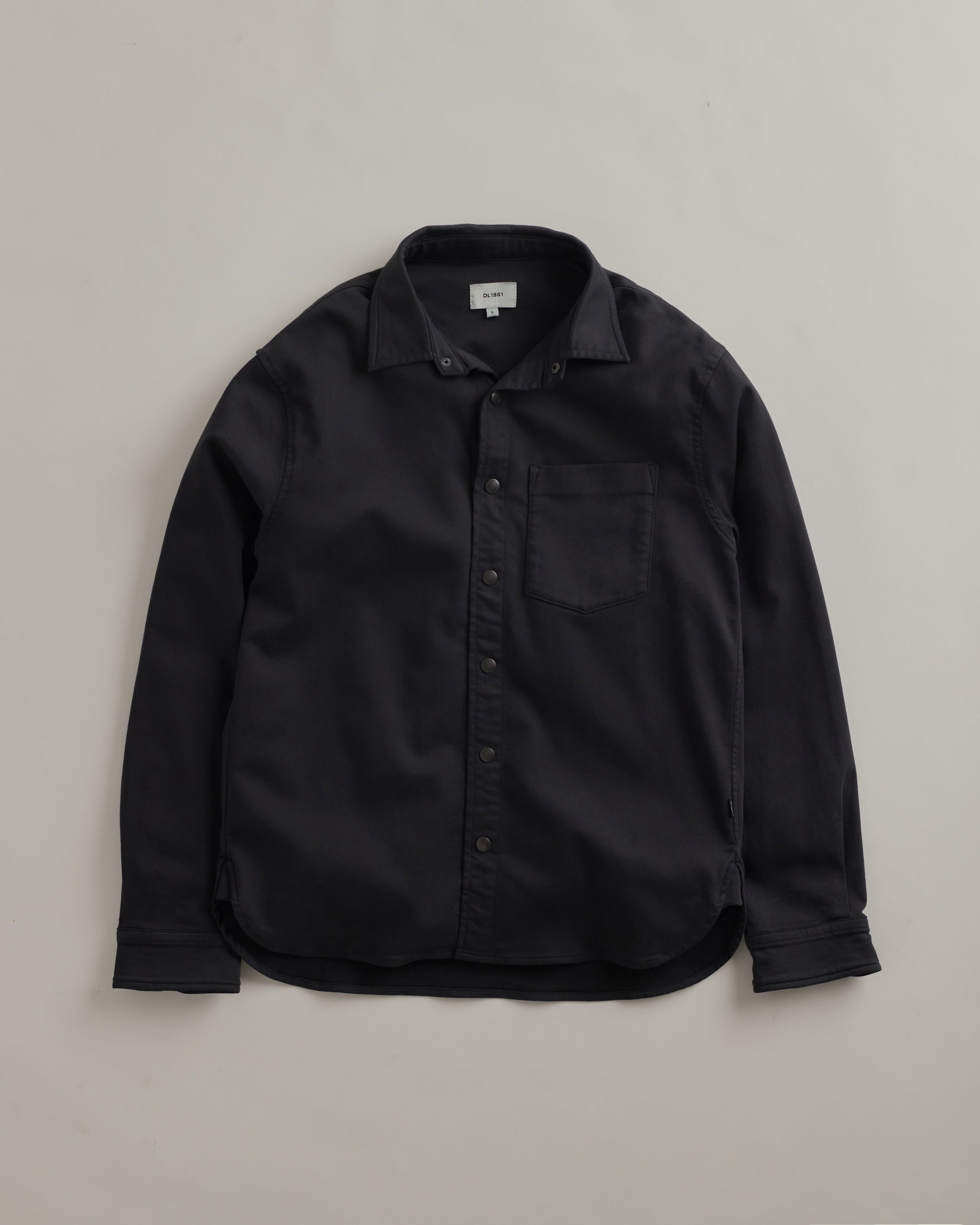 DL1961 men's Dominick Knit Denim Shirt in 'Cavern' — studio flat lay packshot on a plain background, no model.
